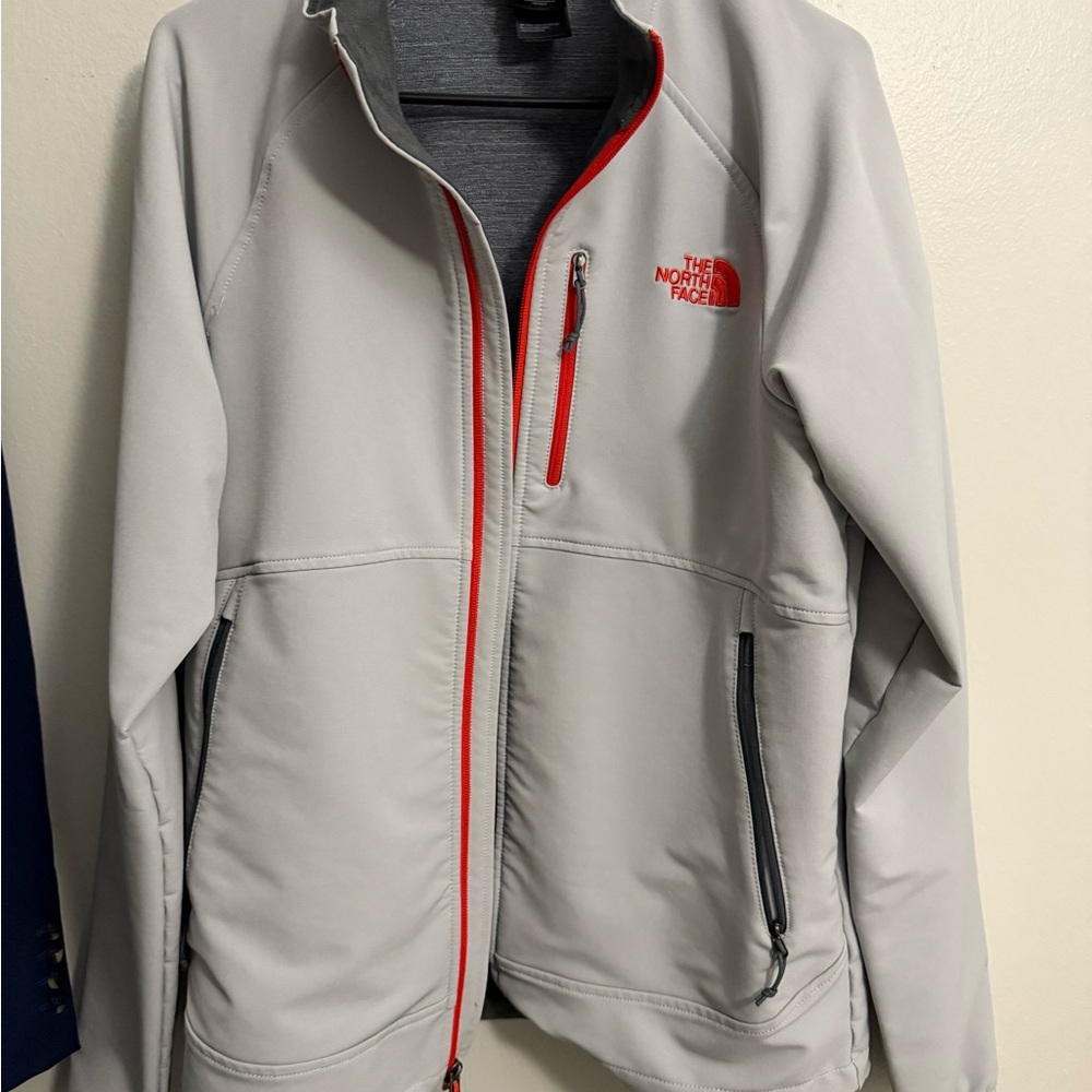 The North Face Gray Jacket with orange Accents